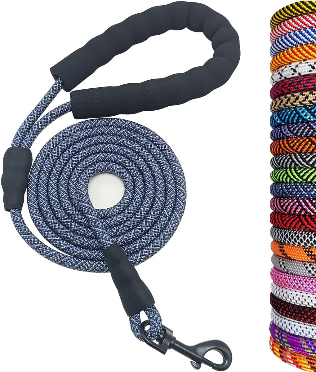 Dog leash with black handle and blue pattern, coiled on a white background