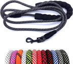 Dog leash with black and gray pattern on a white background, accompanied by a variety of colorful leashes below.