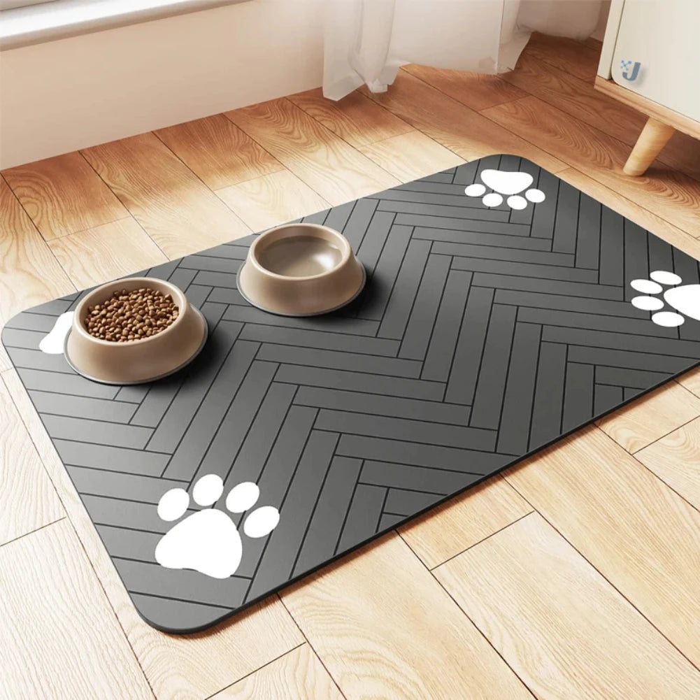 Pet mat with herringbone pattern and paw prints on a wooden floor