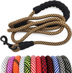 Dog leash with black handle and patterned design, displayed with color options below on a white background.