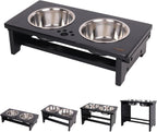 Black elevated pet feeder with two stainless steel bowls on a white background