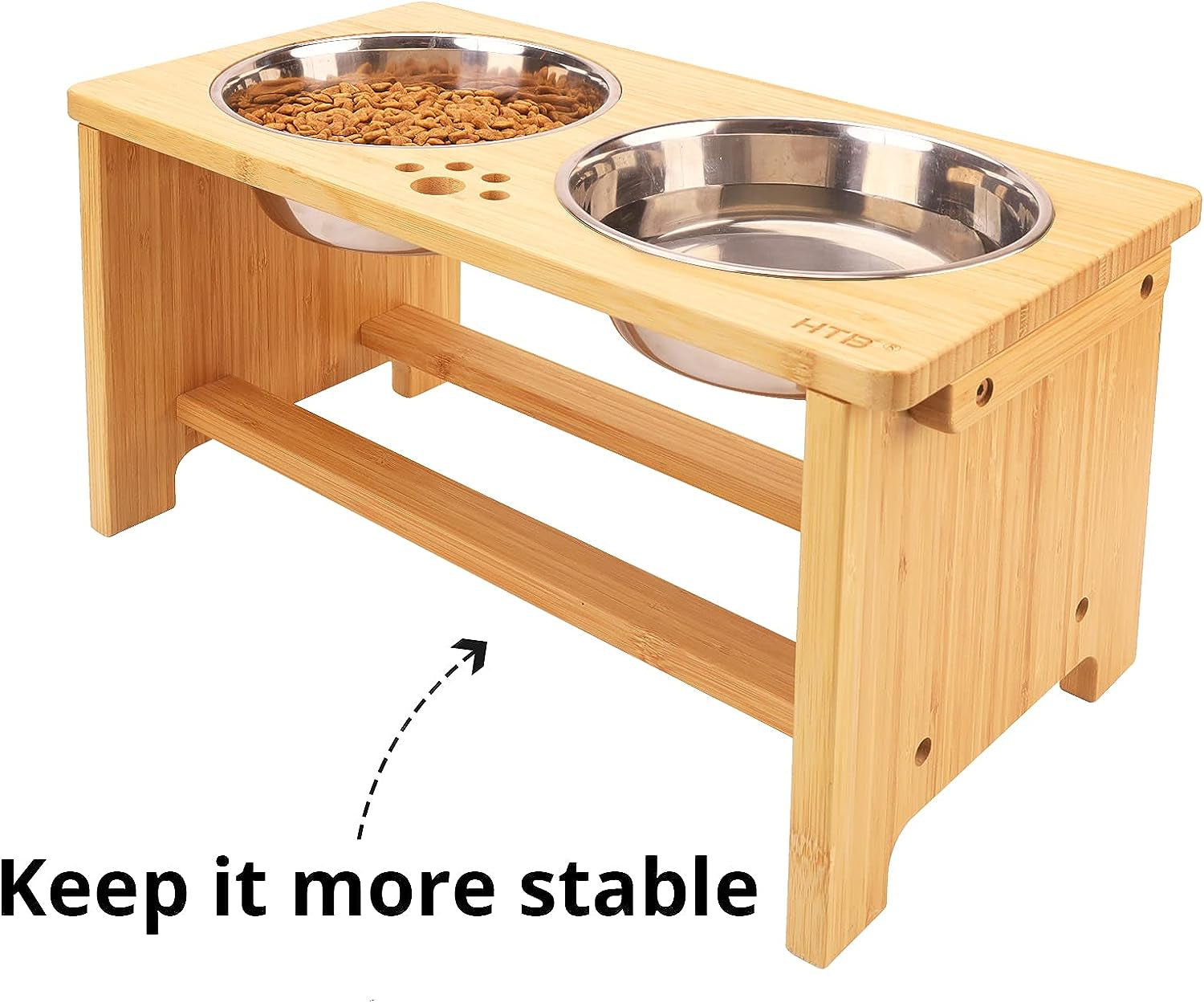 Wooden pet feeding station with two stainless steel bowls on a white background