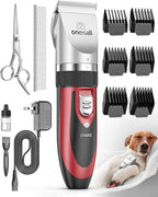 Pet grooming kit with clipper, scissors, and attachments on a white background
